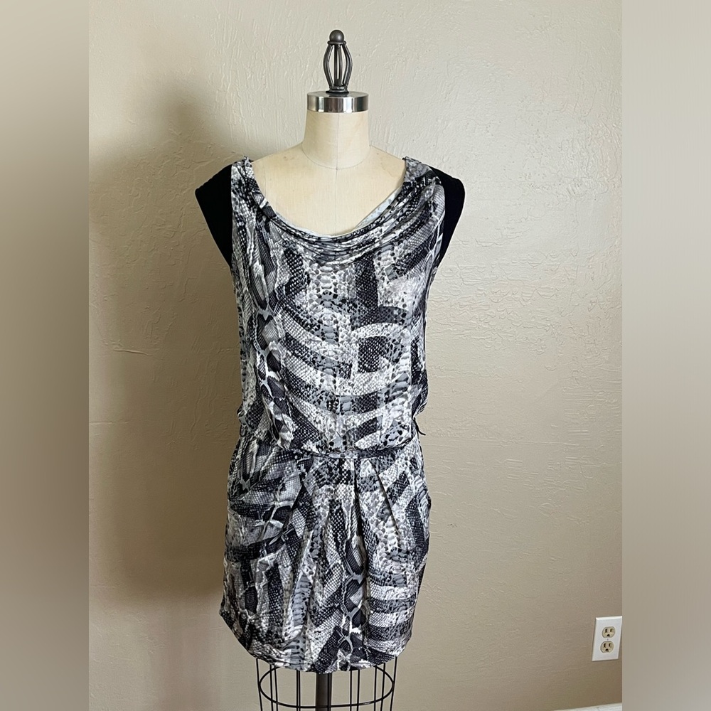 Super cute snakeskin print, form fitted cocktail style dress